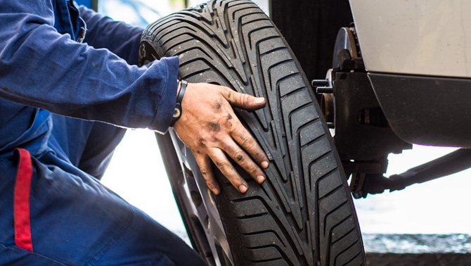 our local mechanics fitting new tyres